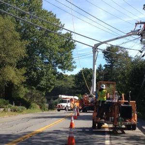 Central Maine Power workers install new power lines along Route 96 to East Boothbay. The projected is slated to be complete by September 23. RYAN LEIGHTON/Boothbay Register