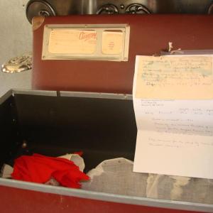 This old foot locker has spent the last several decades at home with Bee King in Wiscasset and Boothbay. It preserved the flag her grandmother sewed for a sloop that King's grandfather built. SUSAN JOHNS/Wiscasset Newspaper