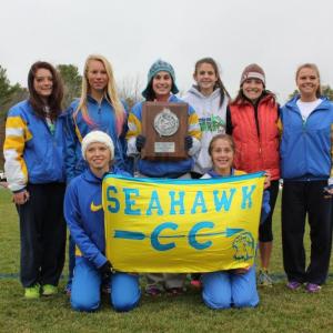 2013 Western Regional runners-up. The BRHS girls team placed second in a field of 12 teams and 88 runners. From left to right, front, Hannah Morley and Kate Friant; back, Tori Schmid, Morgan Crocker, Sophia Thayer, Shaw Pinkham, Coach Lauren Forgues, and Brooke Alley. SUE MELLO/Boothbay Register