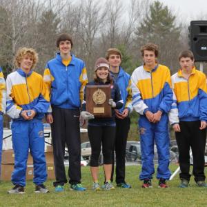 2013 Western Regional Champions. The BRHS boys blew away the field of 14 teams and 97 runners at Twin Brooks on Saturday; BRHS beat its nearest competitor by 50 points. Left to right, Benn Scully, Joey Paolillo, Jack Hasch, Coach Lauren Forgues, Robert Campbell, Matt Burnham, Kyler Carty and Kyle Alamo. SUE MELLO/Boothbay Register