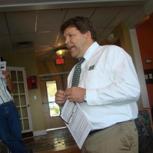 Stefan Keenan of Keenan Auction Company presides over the Coburn House auction on October 18 in Edgecomb. SUSAN :JOHNS/Wiscasset Newspaper