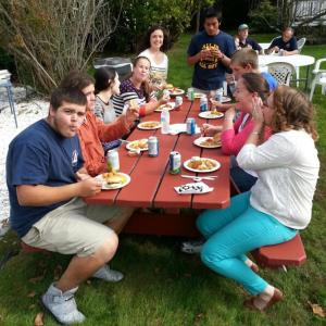 A GROUP of people enjoy Dunton’s closing party. Courtesy of Gary Starankewicz