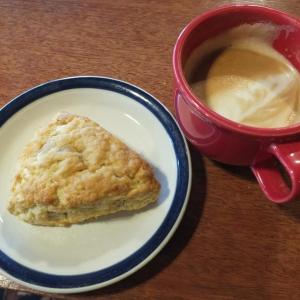 A scone and a latte served in a red cup at Red Cup Coffeehouse. SUZI THAYER/Boothbay Register