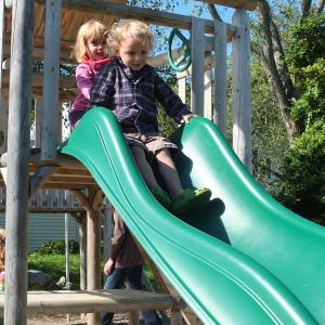 Karen Higgins and Carter Wilson prepare to slide. RYAN LEIGTON/Boothbay Register