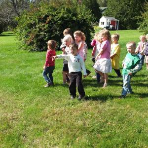 A group of children congregate to count the boxcars on the passing train. RYAN LEIGHTON/Boothbay Register