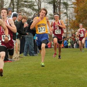 Determination showing in his face, Burnham fought his way to the finish line, leaving other runners in his wake. He finished 16th at 18:48 and fifth for BRHS. SUE MELLO/Boothbay Register