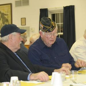 Veterans Bob Jacobson and Palmer Payne have a conversation before the Rotary dinner. At right is Rotarian Bill Kautzmann. KEVIN BURNHAM/Boothbay Register