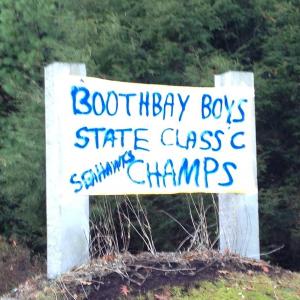 A proud town. A banner congratulating the state champs hung from the town sign at the Boothbay border on November 2. RYAN LEIGHTON/Boothbay Register