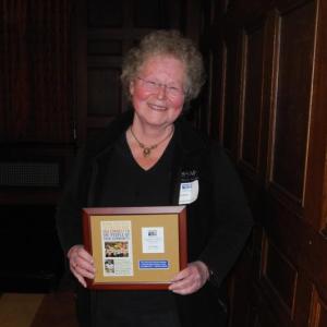 Cheryl Rust, owner of LeGarage, holds the Commerce and Industry Division Award she was presented at the United Way finale. Courtesy of Barbara Reinertsen Cheryl Rust