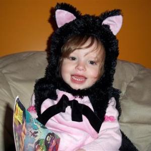 Fluffy Kitty Cat: Miss Emma Rose dresses up as a kitty cat as she reads up on her Halloween stories before heading out to trick-or-treat. Emma’s father Nick Scott entered her in the Boothbay Register’s Halloween Costume contest and won $100 from McSeagull’s. Courtesy of Nick Scott