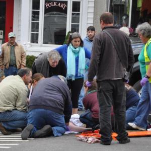 CREWS WORKED quickly to secure a woman who had been struck by a flatbed truck Thursday morning in Wiscasset. The woman was rushed to Maine Medical via Wiscasset Ambulance. BEN BULKELEY/Wiscasset Newspaper