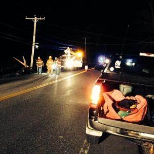 Central Maine Power workers attempt to restore power after a car clipped a utility pole on November 13. MIKE MARR/Boothbay Register