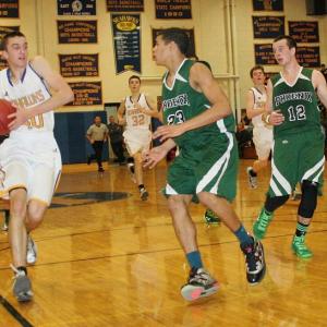 Junior co-captain John Hepburn drives to the basket against Spruce Mountain December 19. Hepburn led the Seahawks with 32 points in the 92-87 double overtime victory over the Phoenix. KEVIN BURNHAM/Boothbay Register Hepburn, John