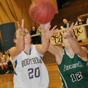 Boothbay guard Hannah Morley and Spruce Mountain guard Ladesta Tracy battle for a loose ball during Wednesday’s game at Boothbay Region High School. KEVIN BURNHAM/Boothbay Register Morley