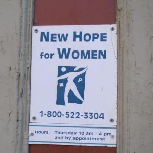 The sign for New Hope’s Belfast office, located directly across the street from the Belfast Police station.