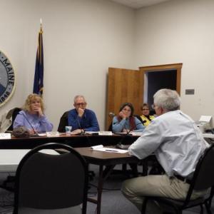 Rep. Mick Devin, D-Newcastle, right, answers a question from Damariscotta Board of Selectmen Chair Joshua Pinkham, left, during the board’s January 15 meeting. Devin discussed, among other things, the state’s revenue sharing outlook. BEN BULKELEY/Wiscasset Newspaper maine politics