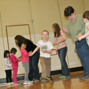 Pre-K students at Boothbay Region Elementary School participate in the walkathon for the Marston family on Friday, March 7. Marking their mileage cards are, from left, Kara Bryer, Kate McEvoy and Christina Barter. KEVIN BURNHAM/Boothbay Register Walk-athon