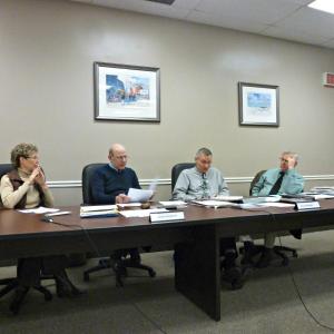 The Boothbay Harbor selectmen discuss the 2014 Spirit of America award. From left: Vice-Chairman Denise Griffin, Board Chairman Bill Hamblen, Russ Hoffman and Jay Warren. KATRINA CLARK/Boothbay Register
