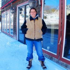 Alison Evans stands in front of the building at 93 Townsend Avenue that she and her husband have bought to house their new ceramics business. SUZI THAYER/Boothbay Register
