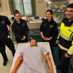 Standing in the Boothbay Region Ambulance Service simulation lab are, from left, Operations Manager and Paramedic Scott Lash, Paramedic Katie Hudson, Advanced Emergency Medical Technician Kerri Dupre and Emergency Medical Technician James Bodman. File photo