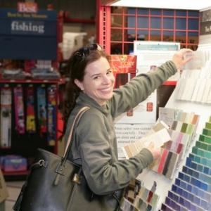 A WOMAN checks out paint swatches at Damariscotta Hardware last year at Ladies’ Day. Courtesy of Albert Lawrence