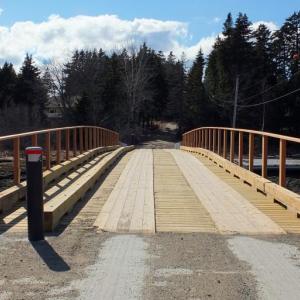 THE NEW CEDAR RAILINGS, designed by Knickerbocker Group, on the bridge connecting Southport to Pratts Island, are almost ready. SUZI THAYER/Boothbay Register