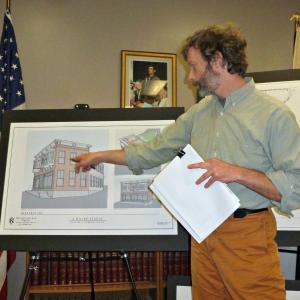 Adam Maltese of Knickerbocker Group discusses the new building being planned for 8 Wharf Street. Here he shows the view of the building as seen from the front of the Ice Cream Factory on Pier 1. KATRINA CLARK/Boothbay Register