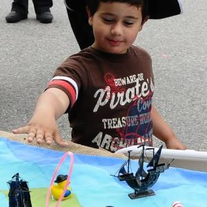 This young pirate is enjoying one of the many activities available for children at the Kid’s Pirate Camp during a past Damariscotta River Pirate Rendezvous. Local nonprofits and individuals supporting them are invited to lend a hand at the Camp in return for a share of the “treasure” earned there during the event to be donated to the nonprofit.