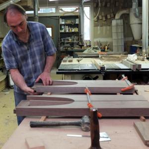 Eben Blaney fitting tenons on one of his commissioned "Cormorant tables" at his shop in Edgecomb. The artist/craftsman of fine furniture, has been selected as an exhibitor in the 38th Annual Philadelphia Museum of Art Craft Show in early November. The Cormorant is one of the five Blaney pieces bound for Philly later this year. LISA KRISTOFF/Boothbay Register Eben Blaney, Edgecomb ME