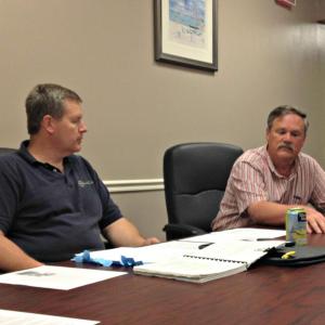 Board Chairman Michael Tomko, left, listens to planning board member Andy Shepard discuss needing rules for non-compliant parking areas similar to rules for non-compliant shoreland zones. “We’ve been flying by the seat of our pants here and that’s never good,” Shepard said. KATRINA CLARK/Boothbay Register