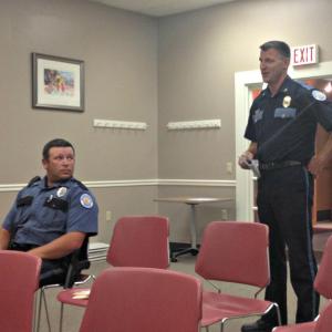 Police Chief Robert Hasch, right, asks the selectmen to promote Nick Upham, left, from reserve to full-time Boothbay Harbor police officer. KATRINA CLARK/Boothbay Register