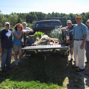 Master Gardener volunteers at Morris Farm load the day’s harvest for delivery to the Boothbay Region Food Pantry on August 20.