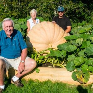 Don Snyder, left, pumpkin grower for the upcoming Columbus weekend Damariscotta Pumpkinfest. Also pictured are Don’s helpers, Debbie Snyder and Nick Upham, Boothbay Harbor Fire Chief. Courtesy of Debbie Snyder