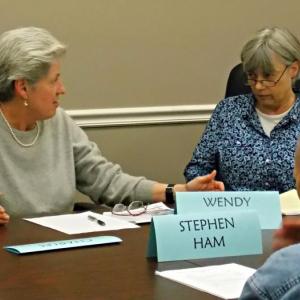 Boothbay Harbor Selectman Wendy Wolf, left, asks Mary Ellen Barnes of the Lincoln County Regional Planning Commission about what the Commission does and how they might work together towards their goal. KATRINA CLARK/Boothbay Register