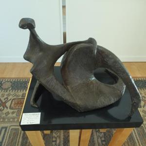 Seated figure in bronze, Roger Milinowski