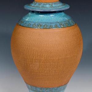 This partially glazed ceramic urn by Peter Jones of Camden is one example of the fine crafts available at the show Nov. 1 and 2 in the Maine State Museum Cultural Building in Augusta. Courtesy of Maine Crafts Guild Ceramic urn by Peter Jones, Camden ME