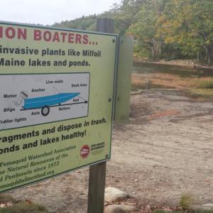 SIGNS LIKE this one (located at Biscay Beach) are just one of the tools used by the Pemaquid Watershed Association to warn boaters about invasive species clinging onto the hulls of boats. There have been no recorded incidents of hydrilla recorded at one of the PWA ponds this year, Executive Director Donna Minnis said. Notice the great blue heron? BEN BULKELEY/Wiscasset Newspaper