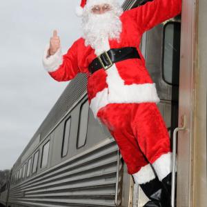 Santa Claus will welcome you on board the Candy Cane Train on Dec. 13 and 14. Courtesy of Tri-County Literacy