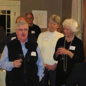 NEW TRUSTEE Neil Cavanaugh introduces himself, as Linda Levenson, also a new trustee, and Cheri Kavanagh look on. Courtesy of Christine Hopf-Lovette