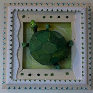 Jeff Barrett’s “Tommy the Turtle,” carved mixed media, 12 x 12