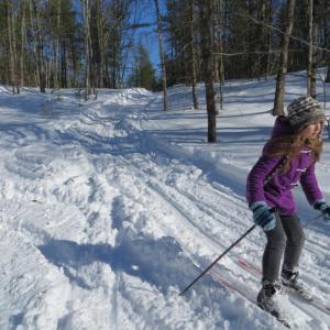 A young skier navigates the trails at Hidden Valley Nature Center. Courtesy of Andy McEvoy