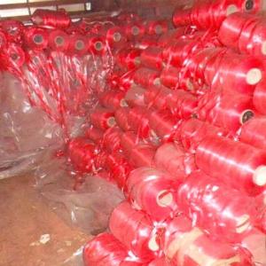 This box of rolls of red ribbon has been depleted some but there are still some rolls left for any ingenious person who wants some. Courtesy of Marc Brewer