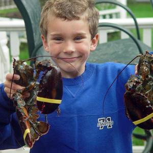 Matt Burnham, at six, shows off his first catch: two big ones! Lisa Burnham photo