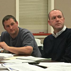 Boothbay Region Ambulance Service Board President Rob Ham, left, and Operations Manager Scott Lash, right, listen to budget committee member Mary Neal explain her concerns over their increased budget at the Feb. 25 meeting. KATRINA CLARK/Boothbay Register