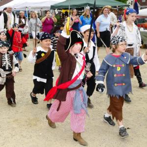 Kid Pirates: Hundreds of children participate in the Damariscotta River Pirate Rendezvous, scheduled for June 20 in Damariscotta, helping to take over the town and find the hidden treasure. This group is part of the Pirate Kids Costume Contest. Courtesy of Ellie Busby