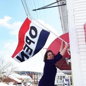 Stacey McLellan got teary-eyed on March 2 when she talked about the first time she hung her “Open” sign at her new business a year ago. SUZI THAYER/Boothbay Register