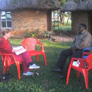Patty Seybold interviewing Mwalimu Musheshe, the founder of URDT and the African Rural University. Courtesy of Patty Seybold