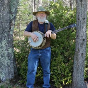 Musician Jeff Herbster plays several types of banjo.