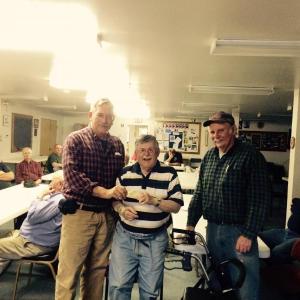 Bill Dodge, center, is honored with a lifetime membership certification of the Boothbay Fire Department at a recent meeting of the department. At left is Boothbay Fire Chief Dick Spofford and at right is Assistant Fire Chief Jack Barry. MIKE MARR/Boothbay Register