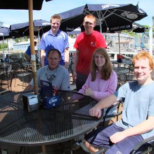 The Miller family, who have taken over Lobsterman’s Wharf in East Boothbay, enjoy a moment of family time on the deck of their new restaurant. Seated, from left, are Dan, Eileen and Zach. Standing are, from left, Killian and Cormac. SUZI THAYER/Boothbay Register